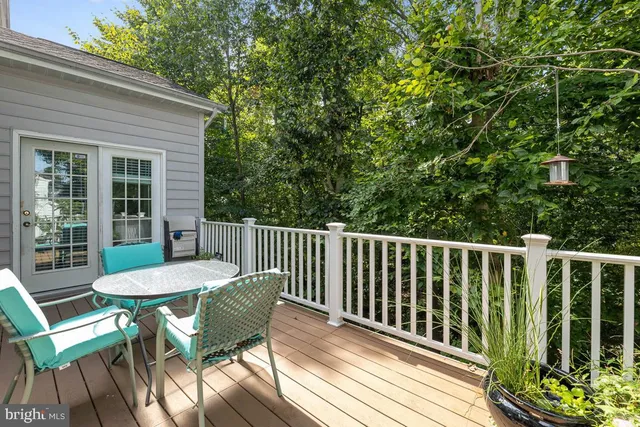a view of a table and chair in the balcony