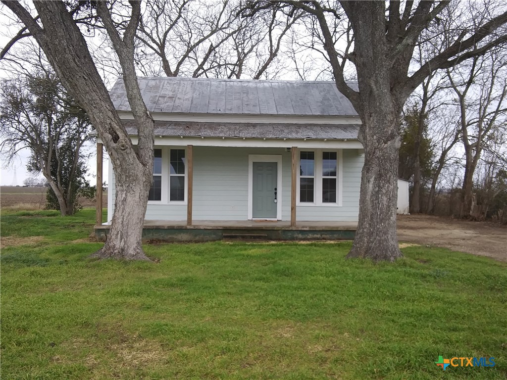 7830 Barbarosa Road New Braunfels, TX 78130 - Photo 2 of 14 a house that has tree in front of a house