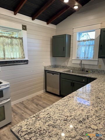 7830 Barbarosa Road New Braunfels, TX 78130 - Photo 8 of 14 a kitchen with a sink and a stove
