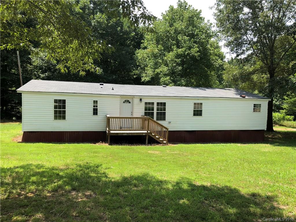 1785 Doe Court Iron Station, NC 28080 - Photo 1 of 14 a view of a house with a yard and sitting area