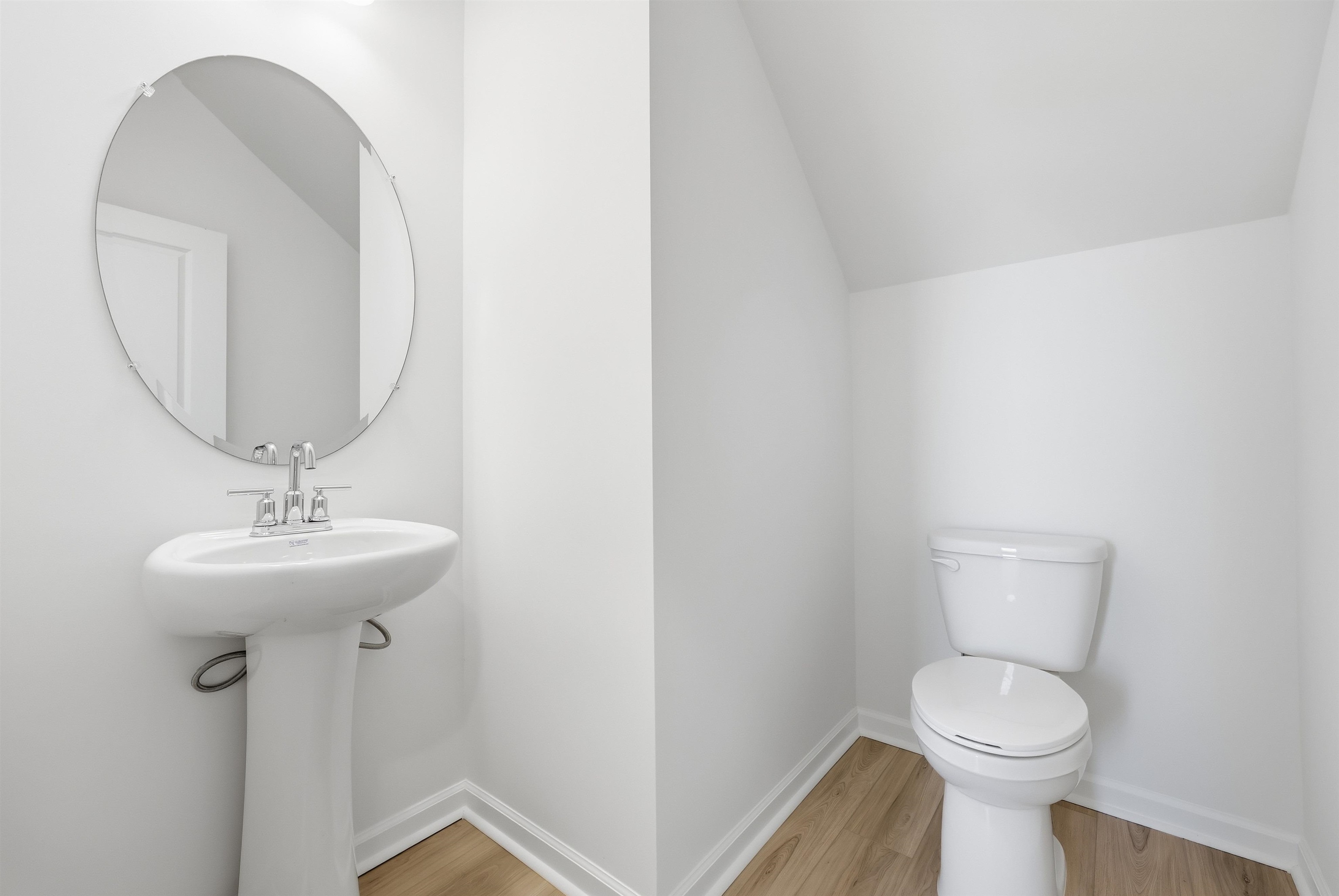 150 River Birch Drive Loris, SC 29569 - Photo 14 of 39 Bathroom featuring lofted ceiling and light wood finished floors