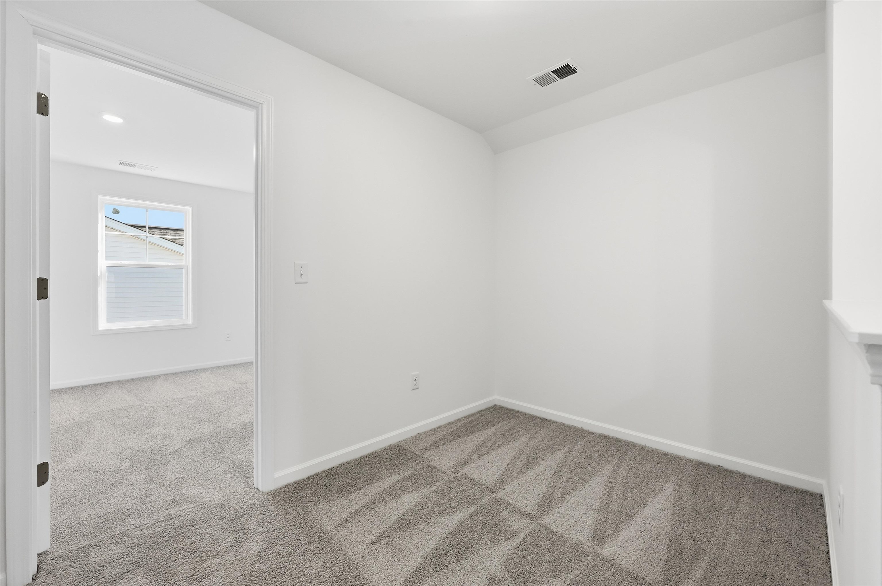 150 River Birch Drive Loris, SC 29569 - Photo 17 of 39 Empty room featuring carpet and baseboards