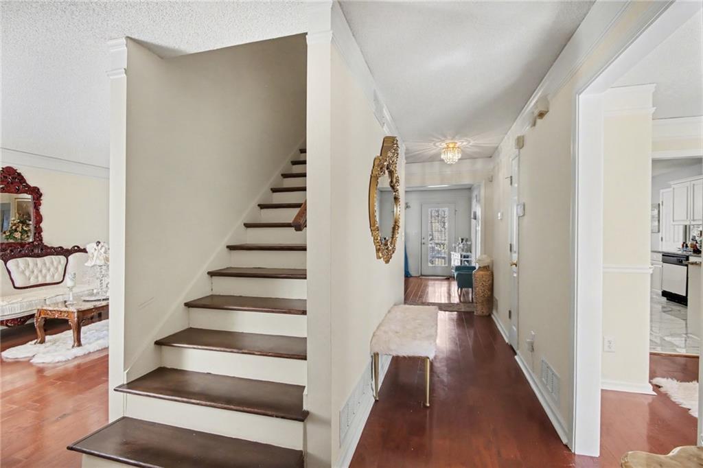 60 Post Oak Trace Villa Rica, GA 30180 - Photo 16 of 34 a view of a hallway with wooden floor and entryway