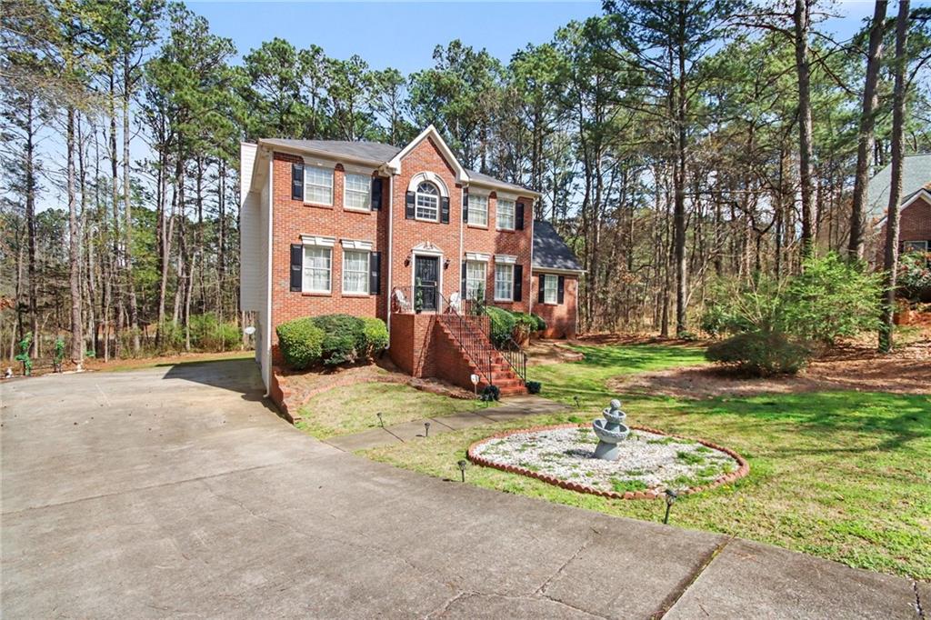 60 Post Oak Trace Villa Rica, GA 30180 - Photo 2 of 34 a view of a house with backyard and sitting area