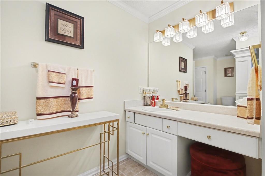 60 Post Oak Trace Villa Rica, GA 30180 - Photo 26 of 34 a bathroom with a sink mirror and vanity