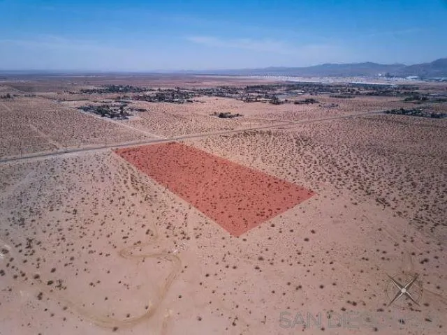 0 Southwest Air Expressway, Unit 5 Adelanto, CA 92301 - Photo 12 of 14 a view of an ocean beach and mountain