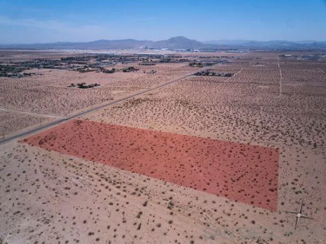 0 Southwest Air Expressway, Unit 5 Adelanto, CA 92301 - Photo 13 of 14 a view of an ocean beach and mountain
