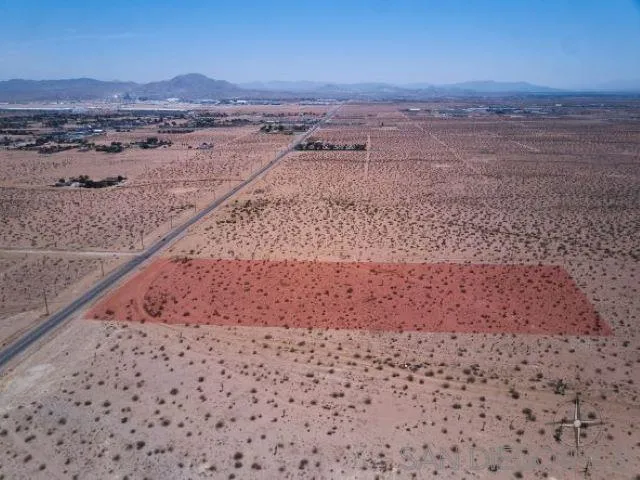 0 Southwest Air Expressway, Unit 5 Adelanto, CA 92301 - Photo 14 of 14 a view of an ocean beach and mountain