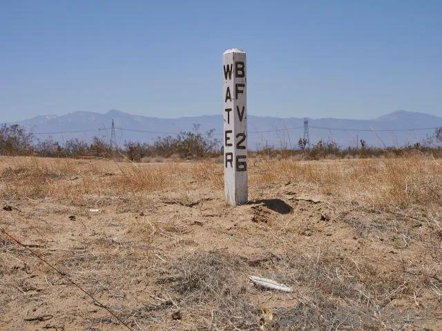 0 Southwest Air Expressway, Unit 5 Adelanto, CA 92301 - Photo 3 of 14 a view of a lake with a mountain in the background