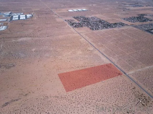 0 Southwest Air Expressway, Unit 5 Adelanto, CA 92301 - Photo 6 of 14 a view of a road with an empty space