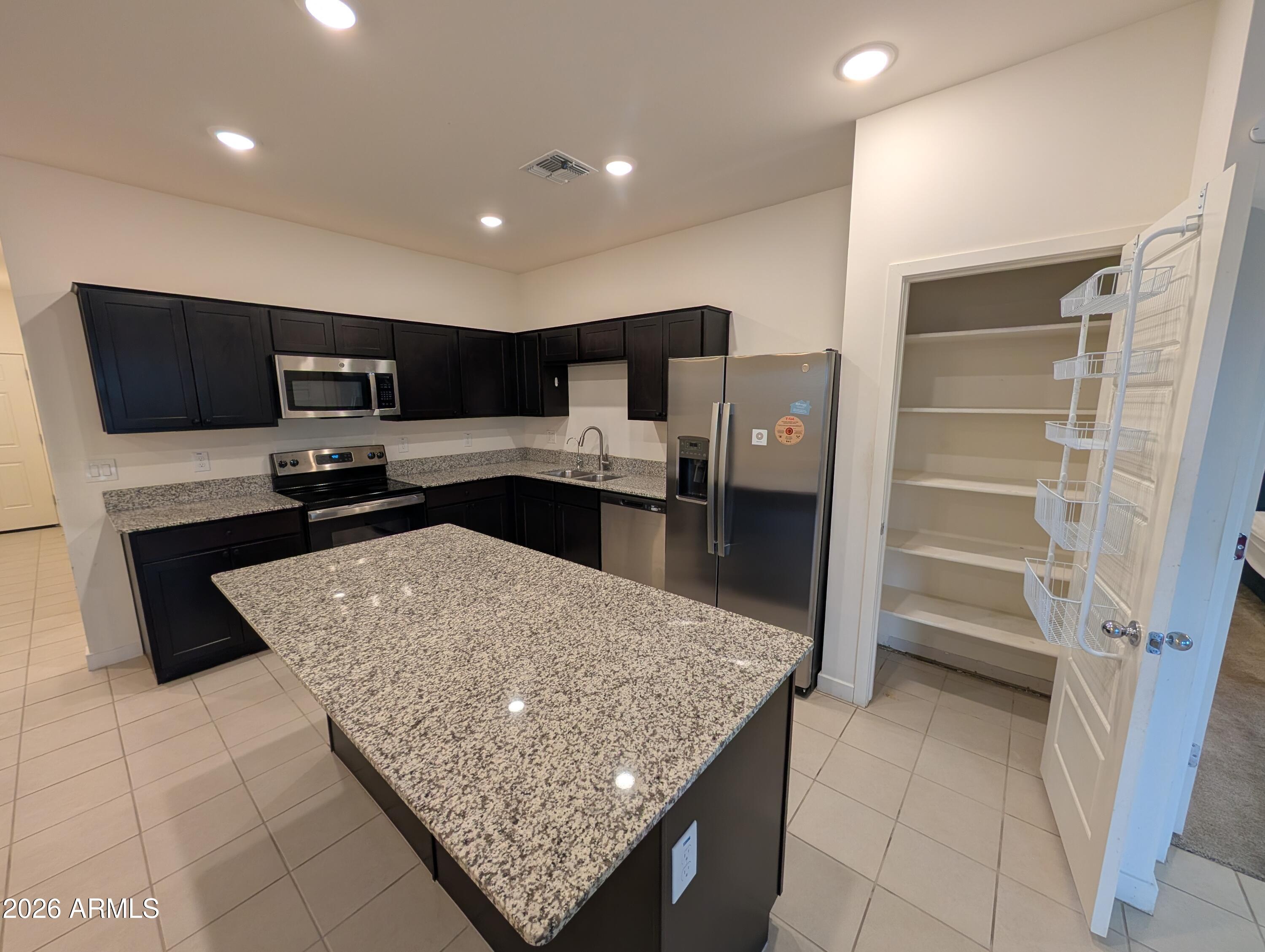 2769 East Fossil Ridge Road Phoenix, AZ 85050 - Photo 2 of 20 Kitchen and Pantry