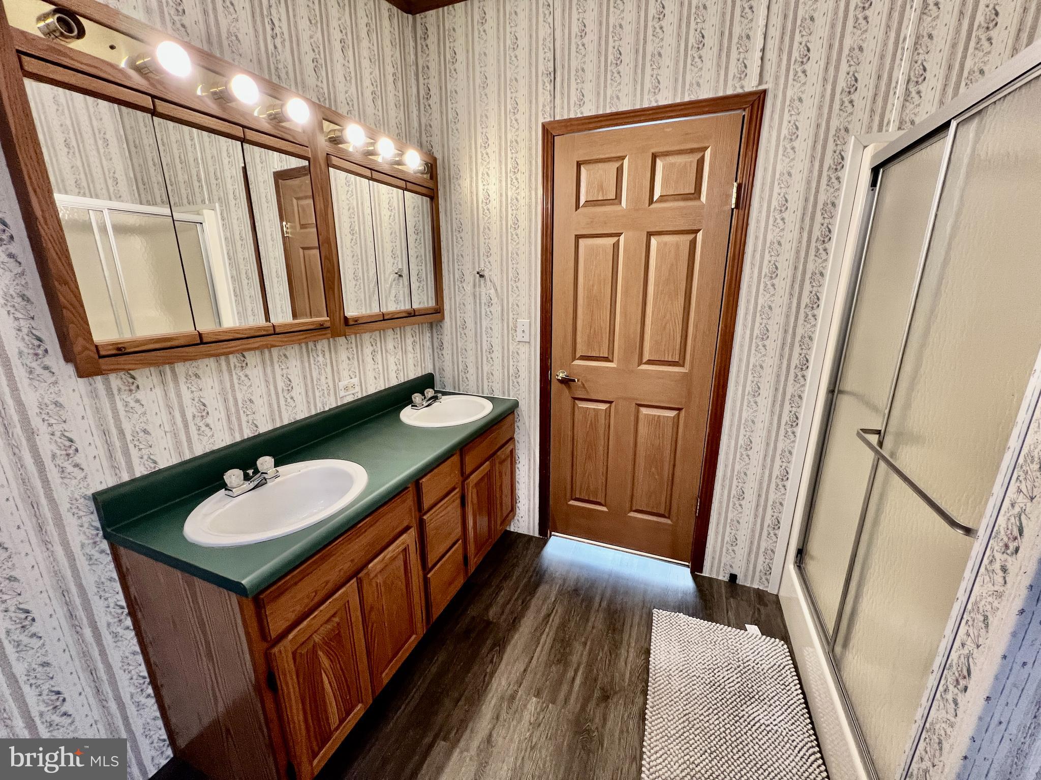 16583 Laurel Road Laurel, DE 19956 - Photo 22 of 34 a bathroom with a sink a toilet and shower