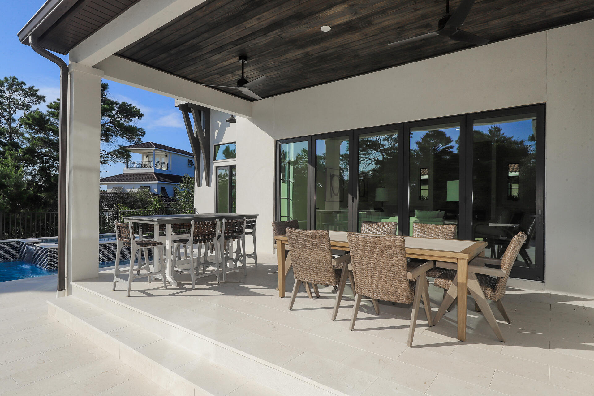191 Sea Winds Drive Santa Rosa Beach, FL 32459 - Photo 12 of 53 a building outdoor space with patio furniture and potted plants