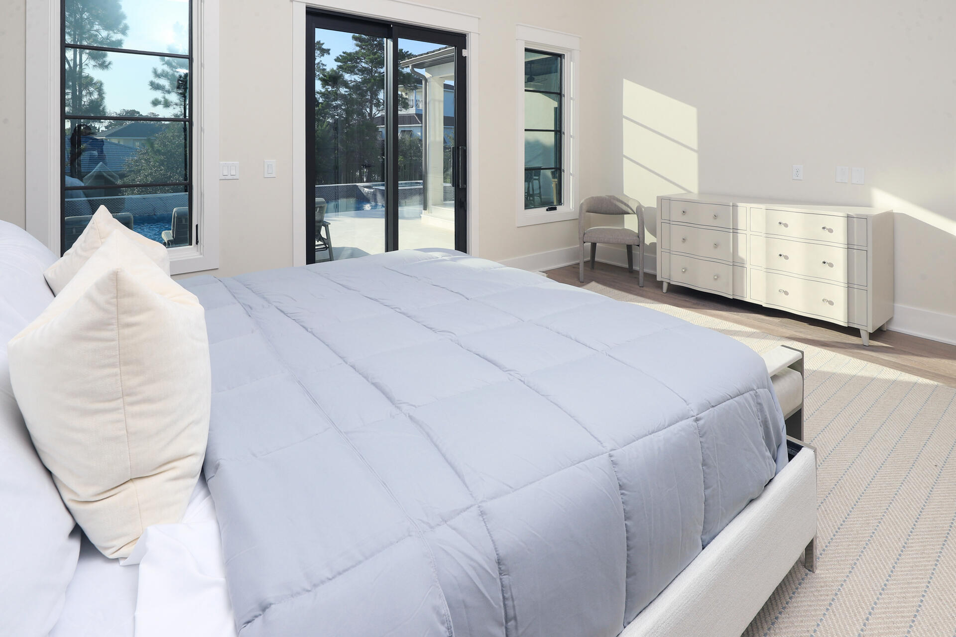 191 Sea Winds Drive Santa Rosa Beach, FL 32459 - Photo 18 of 53 a bedroom with a bed and large window