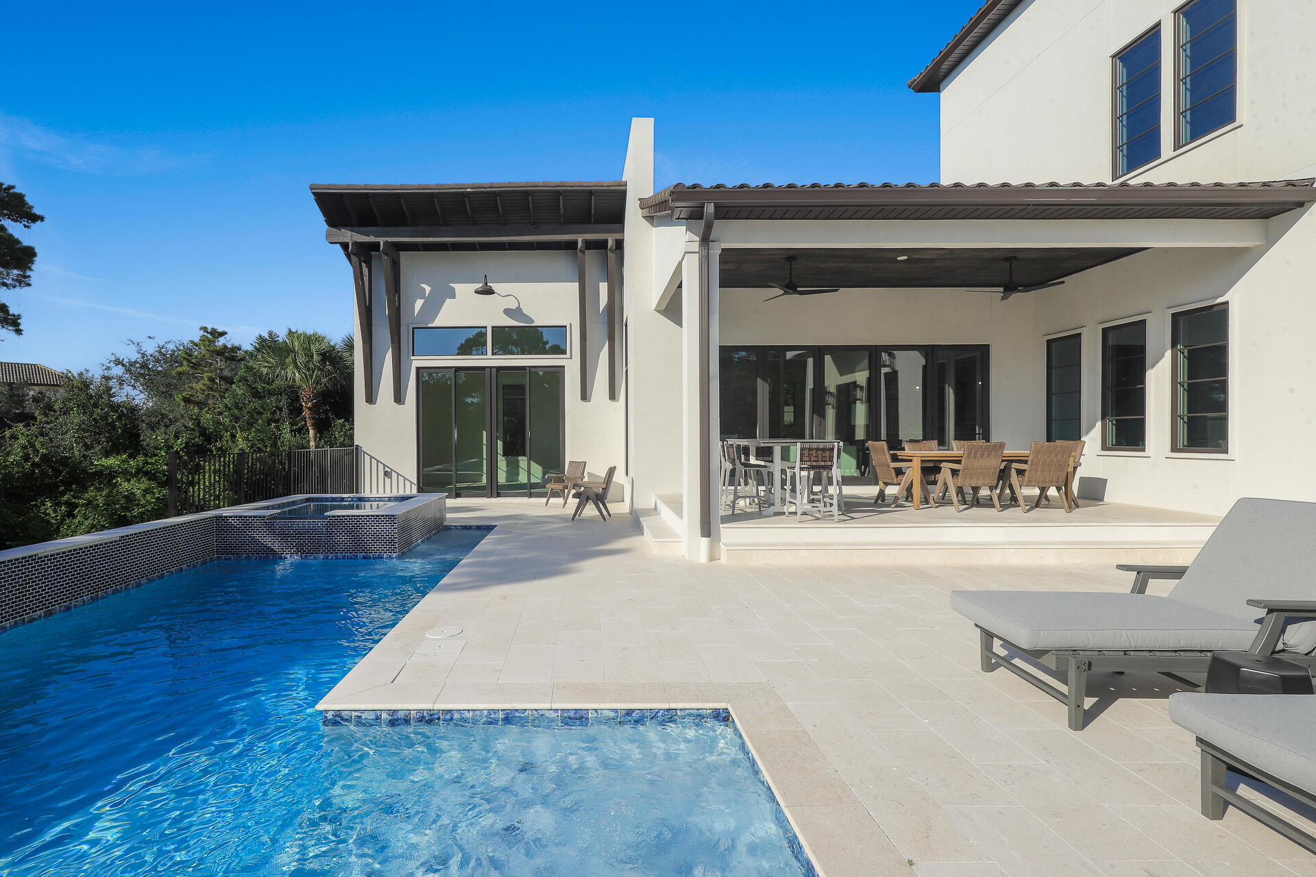 191 Sea Winds Drive Santa Rosa Beach, FL 32459 - Photo 23 of 53 front view of a house with a patio