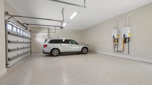 a spacious bathroom with a double vanity sink mirror and double