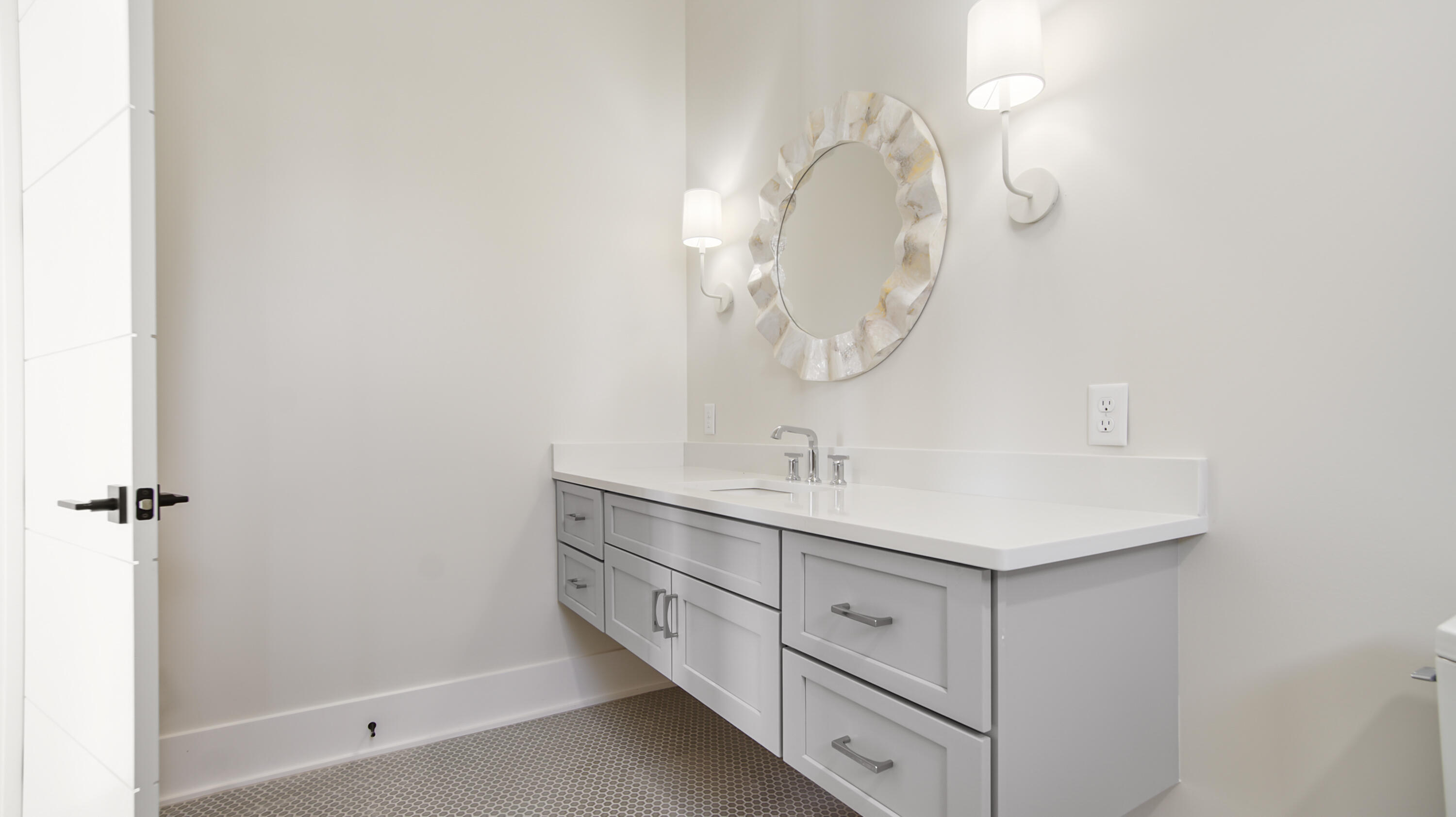 191 Sea Winds Drive Santa Rosa Beach, FL 32459 - Photo 32 of 53 a bathroom with a sink a mirror and shower