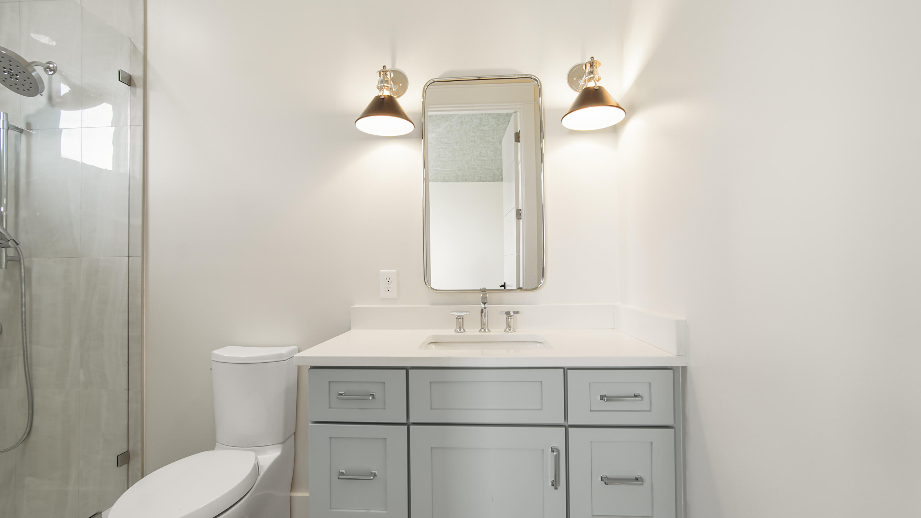 191 Sea Winds Drive Santa Rosa Beach, FL 32459 - Photo 48 of 53 a bathroom with a toilet sink and mirror