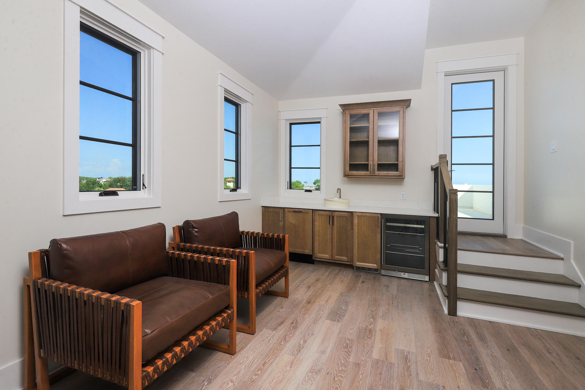 191 Sea Winds Drive Santa Rosa Beach, FL 32459 - Photo 50 of 53 a living room with furniture and a wooden floor