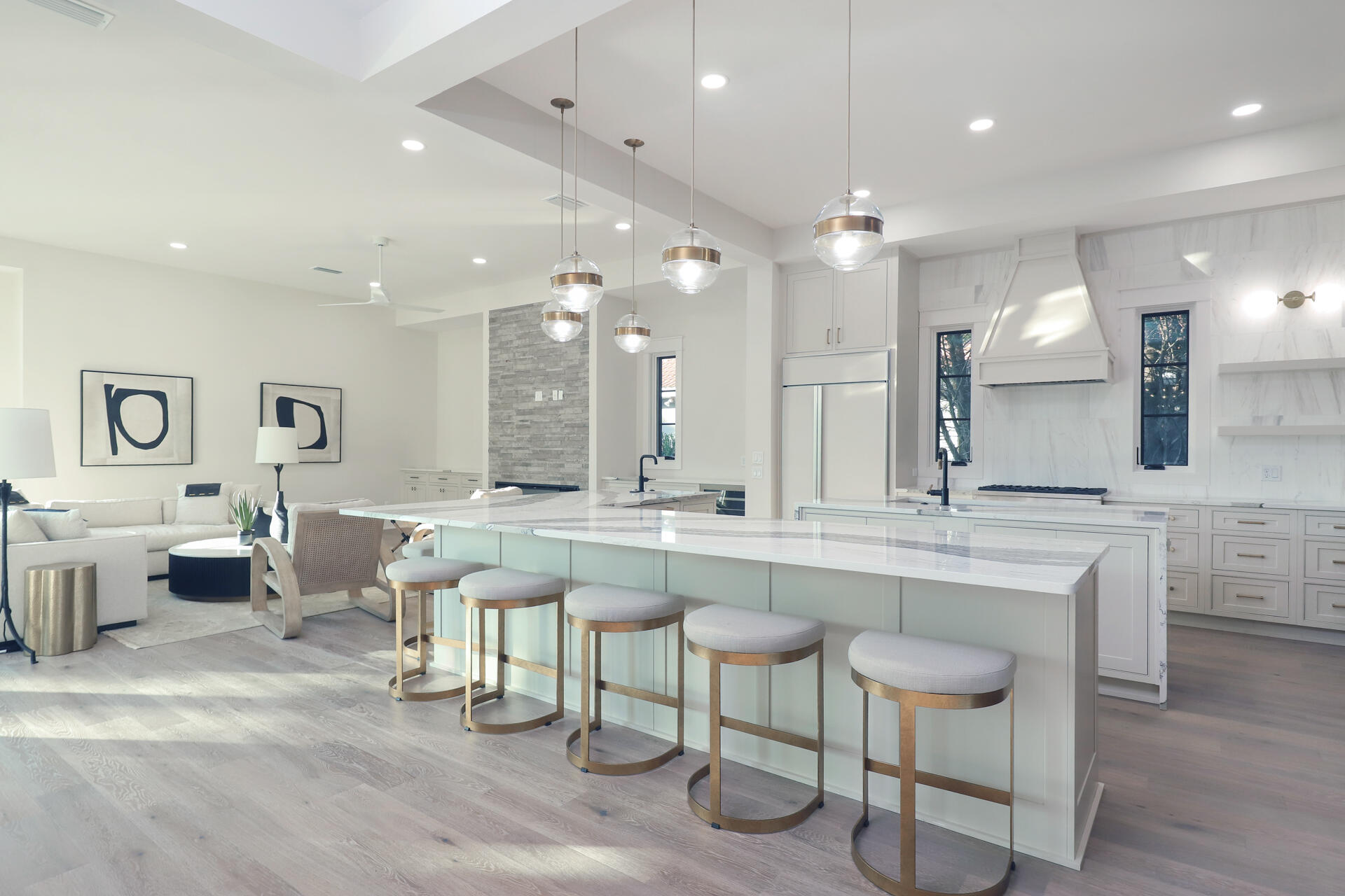 191 Sea Winds Drive Santa Rosa Beach, FL 32459 - Photo 5 of 53 a large kitchen with a large counter top space appliances and a chandelier