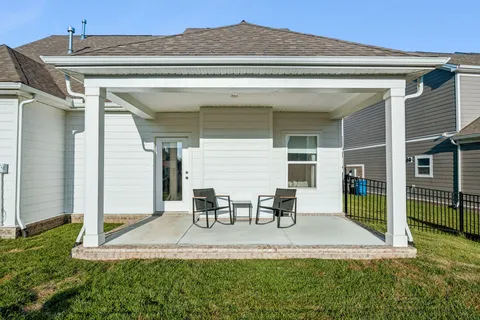 a view of house with patio