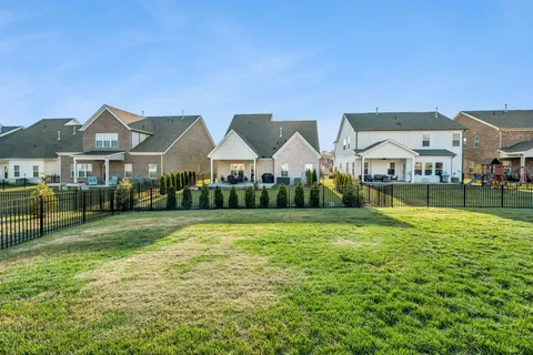 a view of a house with a big yard