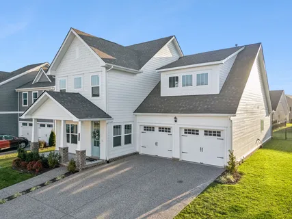 a view of a city with a lake