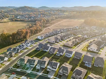 an aerial view of residential building and lake view