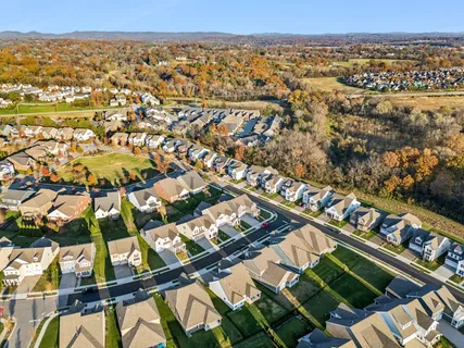 a view of a house with a swimming pool