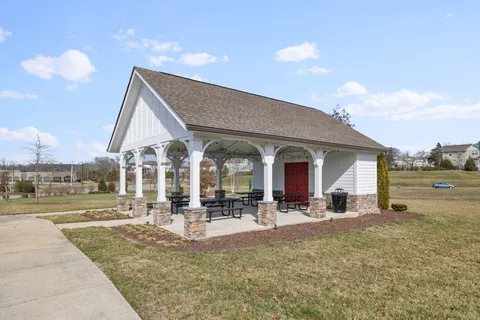 a view of a swimming pool with a lounge chairs