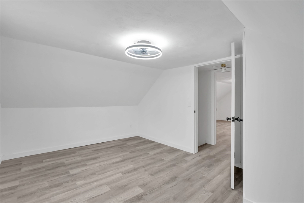 155 Powell Avenue Springfield, MA 01118 - Photo 21 of 41 a view of a room with wooden floor