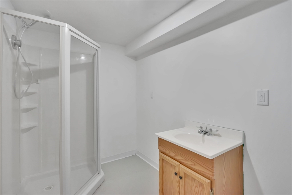 155 Powell Avenue Springfield, MA 01118 - Photo 30 of 41 a bathroom with a sink toilet and shower