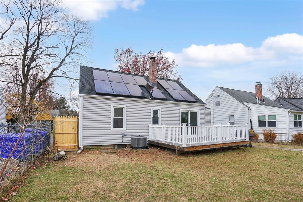 155 Powell Avenue Springfield, MA 01118 - Photo 38 of 41 front view of a house with a garden and deck