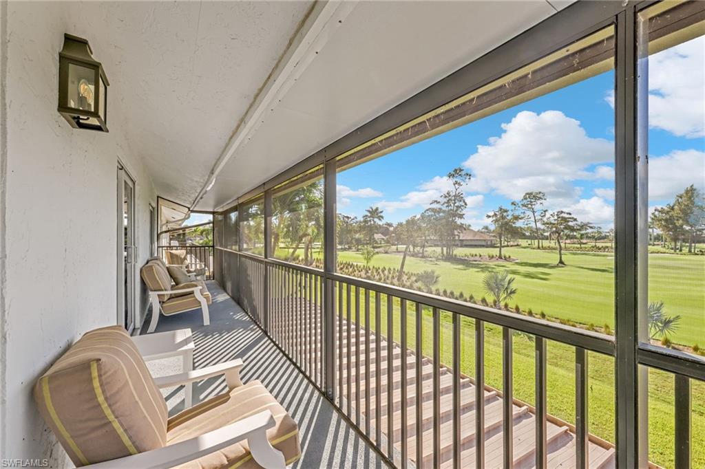 138 Teryl Road, Unit 42 Naples, FL 34112 - Photo 11 of 34 a view of a porch with furniture
