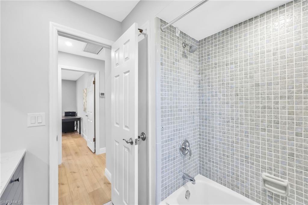 138 Teryl Road, Unit 42 Naples, FL 34112 - Photo 23 of 34 a bathroom with a toilet and a shower