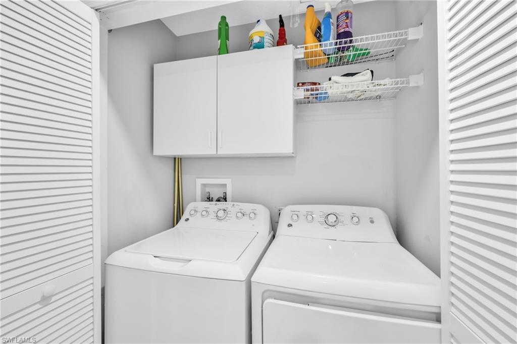138 Teryl Road, Unit 42 Naples, FL 34112 - Photo 24 of 34 a utility room with dryer and washer