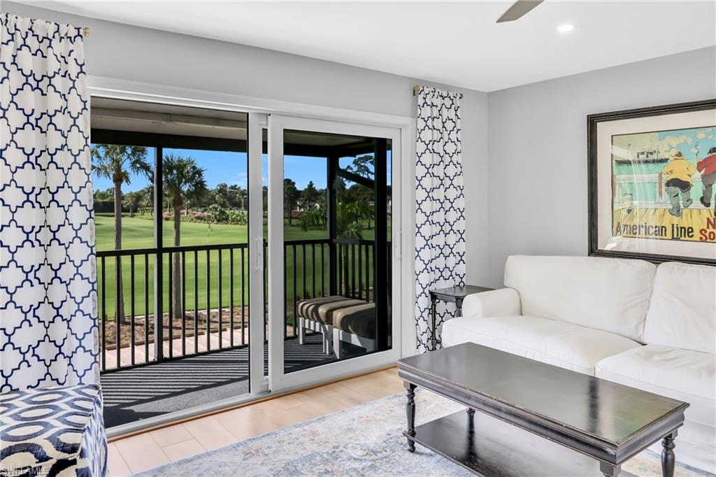 138 Teryl Road, Unit 42 Naples, FL 34112 - Photo 10 of 34 a living room with furniture a window and a potted plant