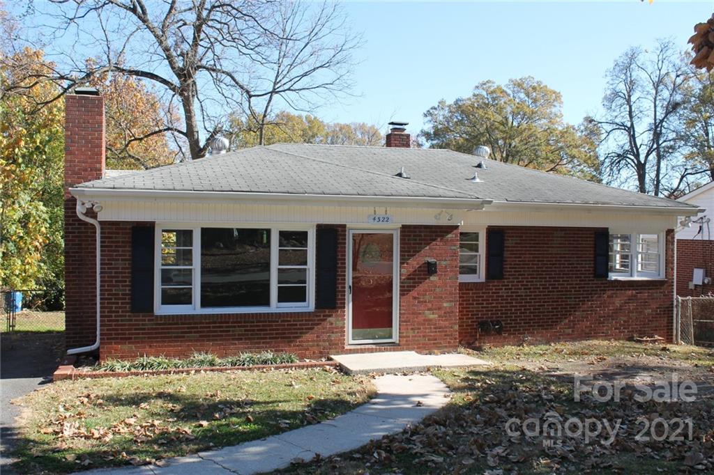4322 Tillman Road Charlotte, NC 28208 - Photo 2 of 20 a front view of a house with garden