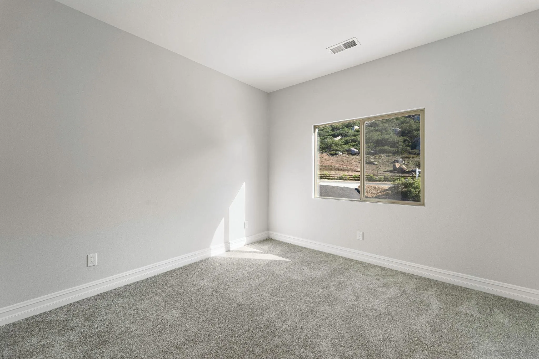 12544 Via Vigneto Lakeside, CA 92040 - Photo 18 of 30 an empty room with windows