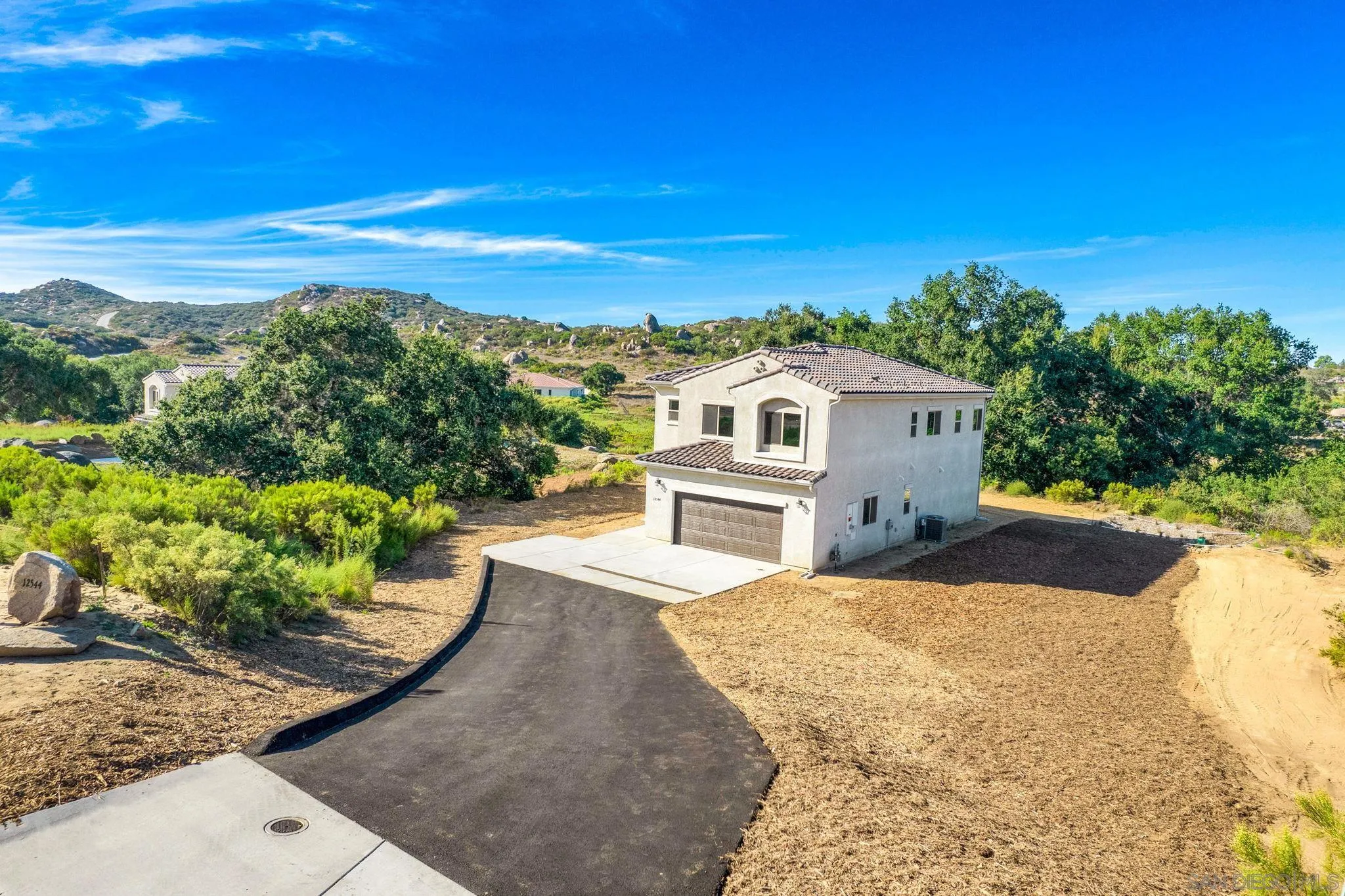 12544 Via Vigneto Lakeside, CA 92040 - Photo 29 of 30 a view of house with outdoor space