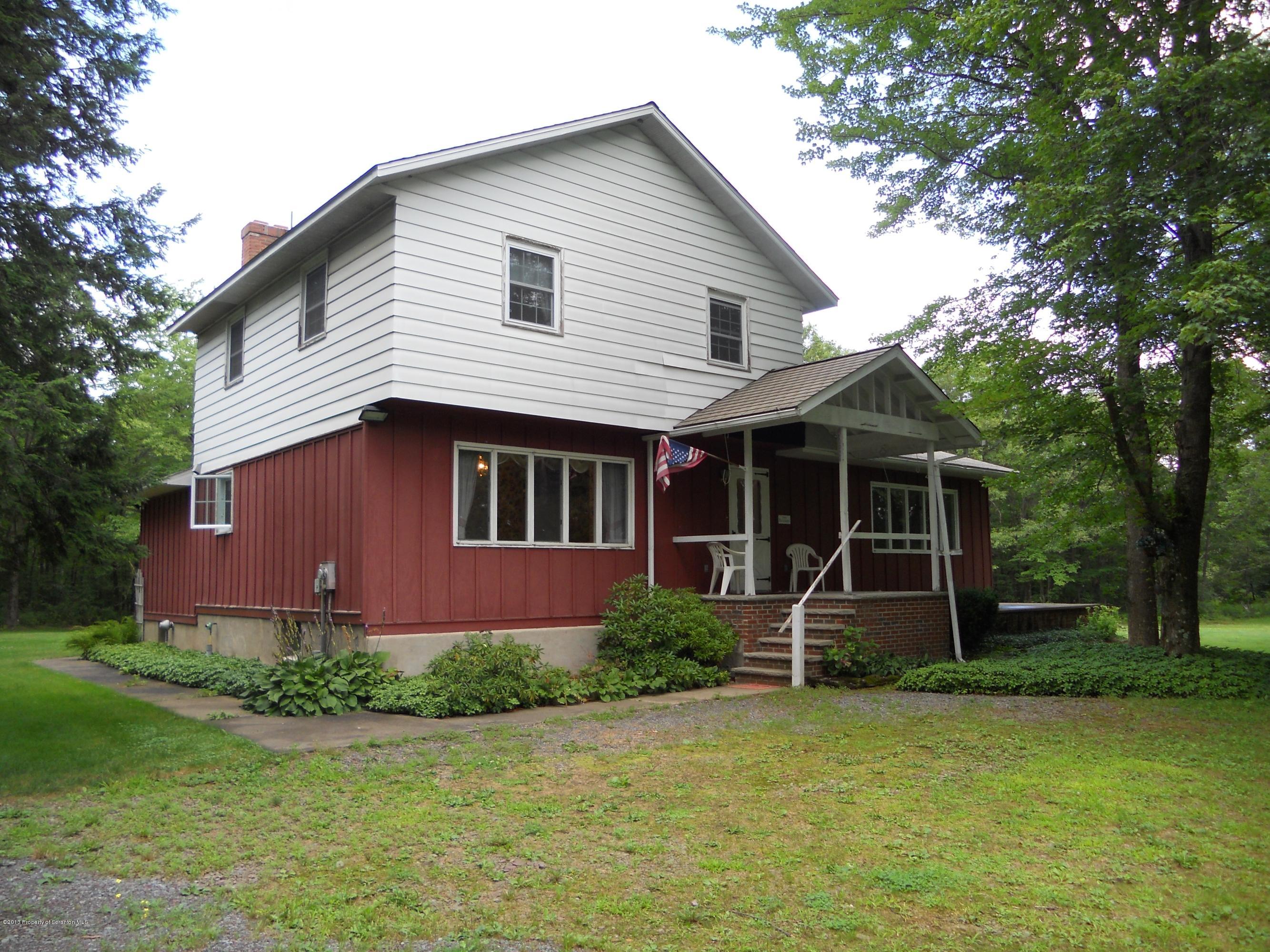 125 Fitzpatrick Road Lake Ariel, PA 18436 - Photo 2 of 61 a front view of a house with garden