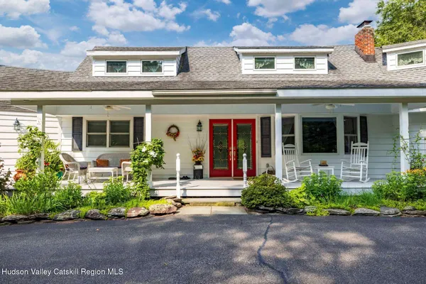 a kitchen with stainless steel appliances granite countertop a refrigerator sink and stove