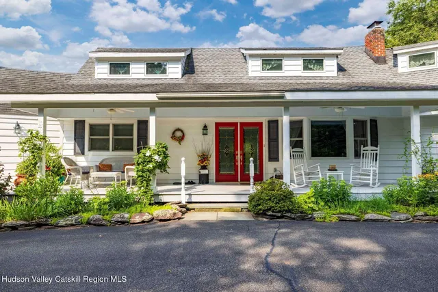 a kitchen with stainless steel appliances granite countertop a refrigerator sink and stove