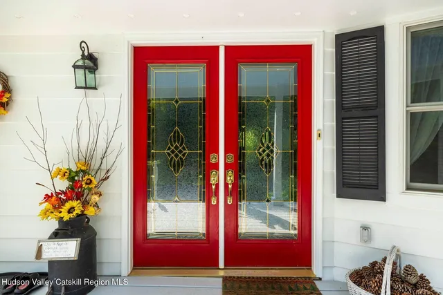 a living room with furniture and a table