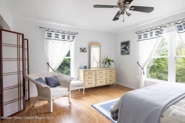 a bed room with a bed and a couch