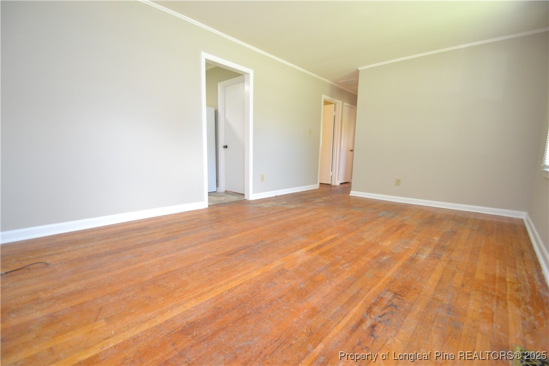717 Friar Tuck Road Raleigh, NC 27610 - Photo 2 of 31 a view of an empty room