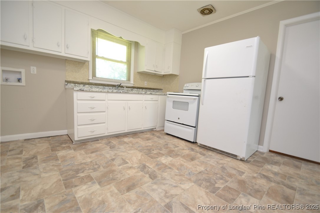 717 Friar Tuck Road Raleigh, NC 27610 - Photo 7 of 31