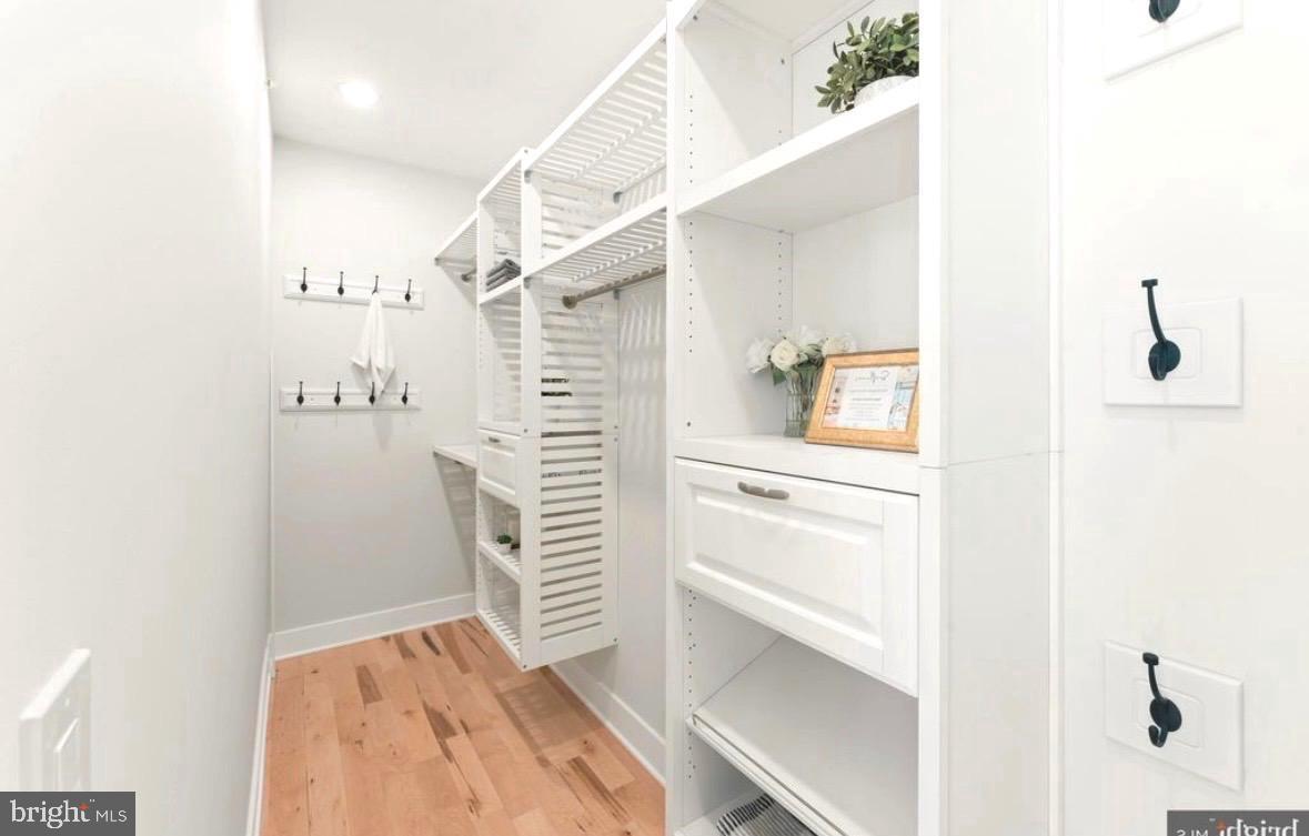 6983 Silverwood Street Philadelphia, PA 19128 - Photo 6 of 18 a view of walk in closet with empty racks