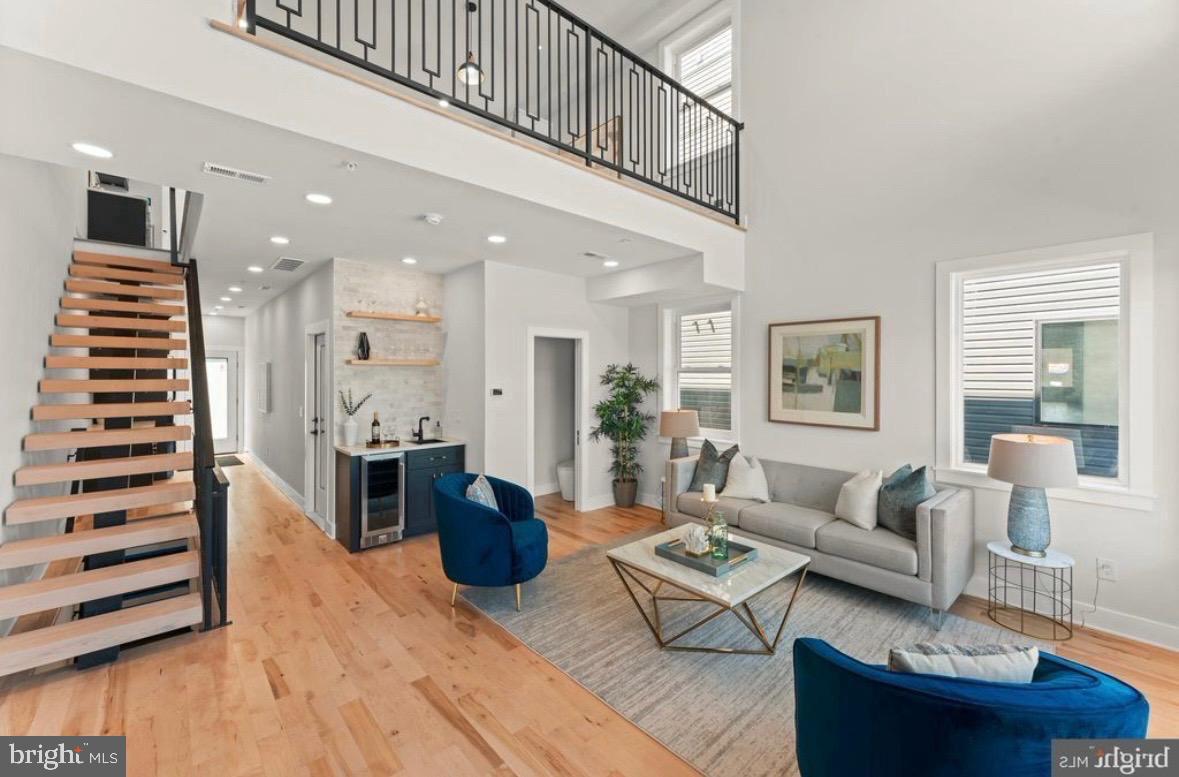 6983 Silverwood Street Philadelphia, PA 19128 - Photo 7 of 18 a living room with furniture and wooden floor