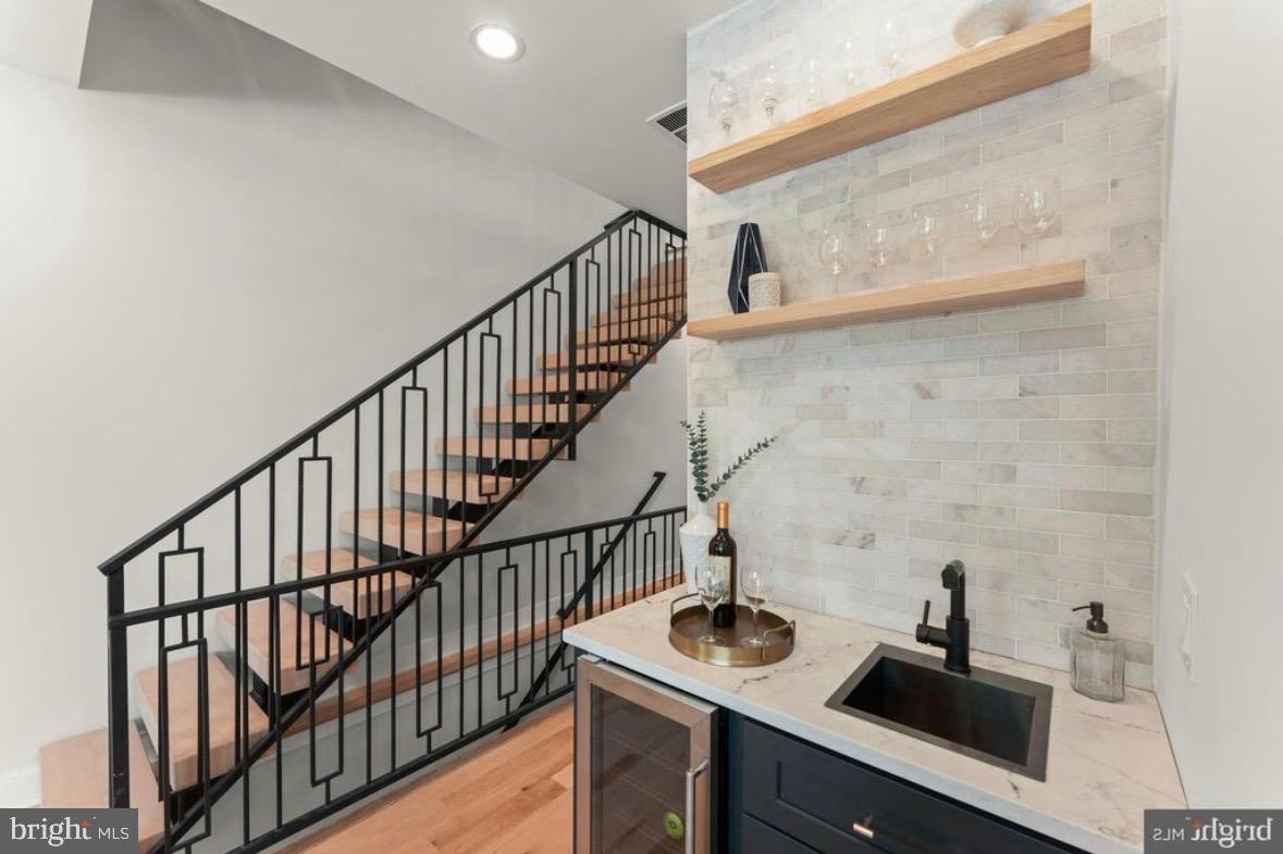 6983 Silverwood Street Philadelphia, PA 19128 - Photo 8 of 18 a view of entryway and kitchen